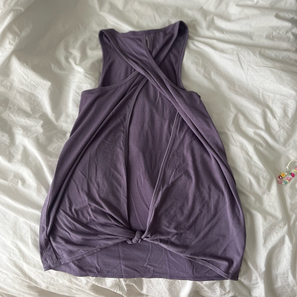 Open twist back tank top.